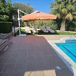 With Fabulous Barbeque House Вилла Кирения